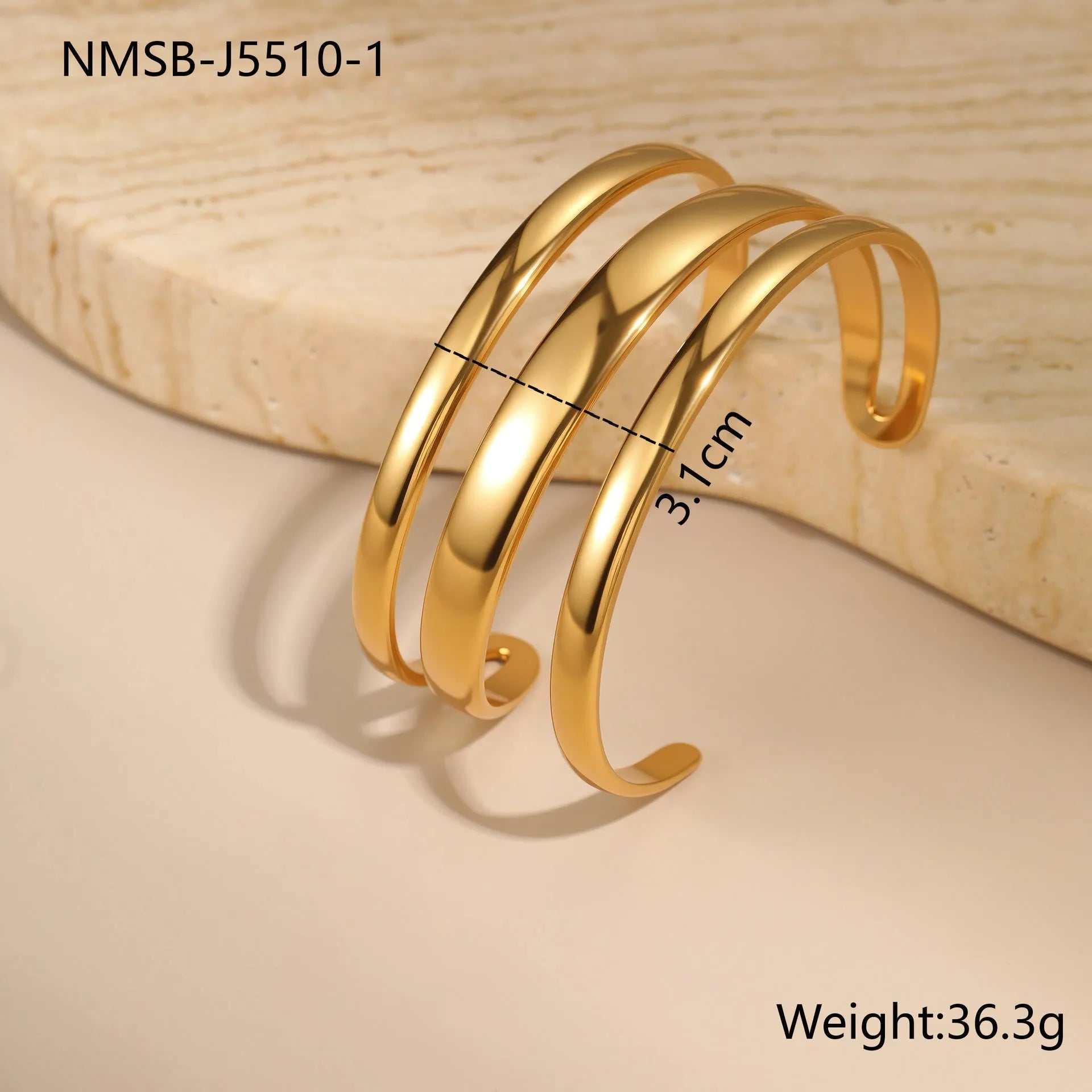 Geometric stainless steel women's bracelet with simple opening, available in gold or steel colour with linear design elements