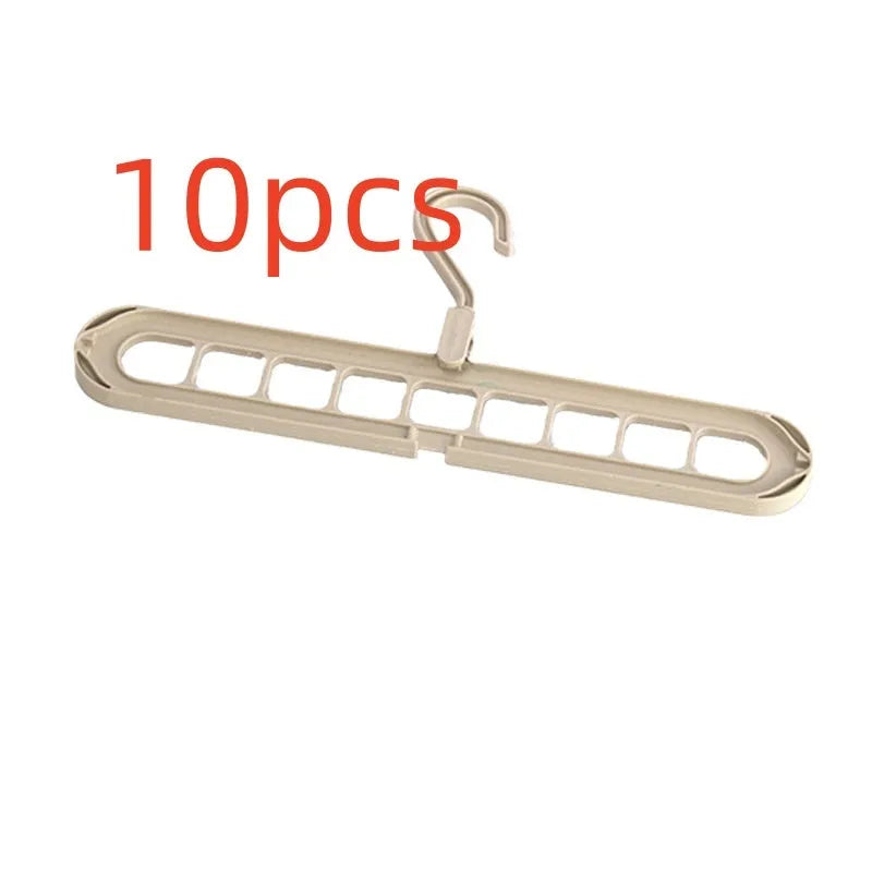 Plastic nine-hole folding pant hanger in multiple colours for dormitory wardrobe organisation