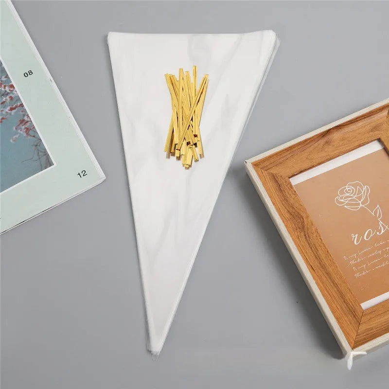 Clear triangle-shaped plastic bag with a twisted metal tie wire closing the top.