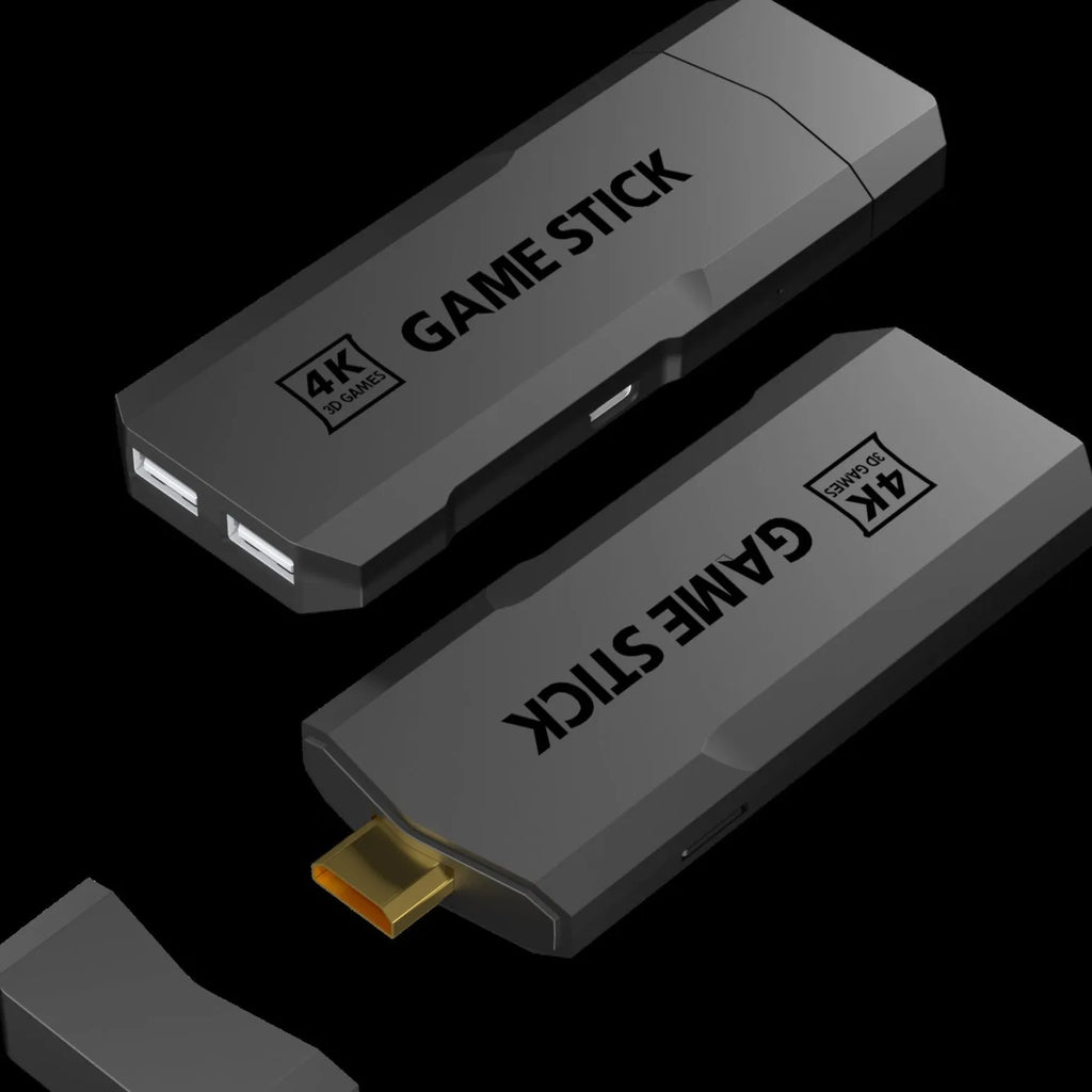 Compact black ABS wireless game console with handle, placed next to HDMI and charging cables on a surface.