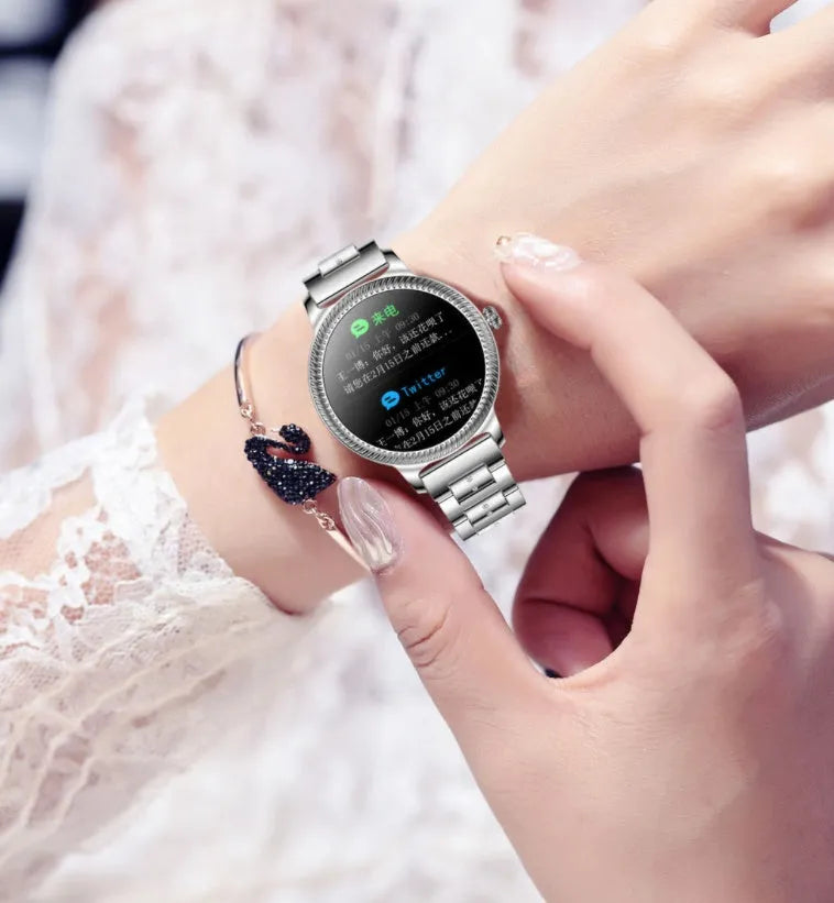 AK38 ladies smart watch with stainless steel Milanese band and 1.09-inch colour screen displaying time