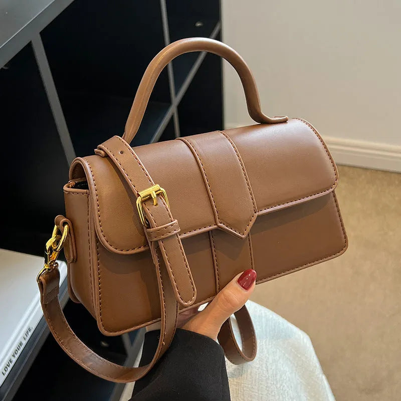 Women's PU leather messenger bag in horizontal square shape with file organisation and sandwich pocket