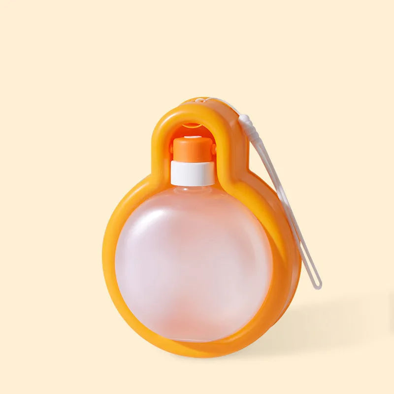 Green portable dog travel water bottle with integrated drinking bowl dispenser.