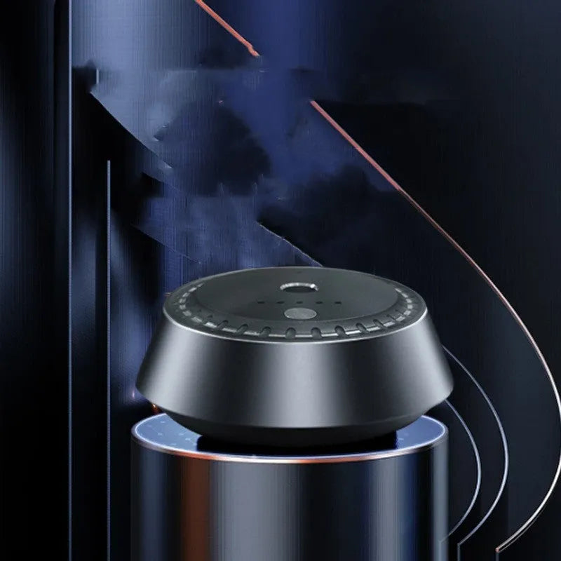 Black metal car aroma diffuser measuring 9cm by 4.5cm with USB charging port
