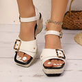 Women's white chunky heel sandals with a metal buckle and square-toe design on a rubber sole.