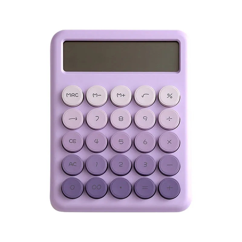 Desktop calculator with a gradient colour design in violet, blue, green, and pink tones on a white desk.