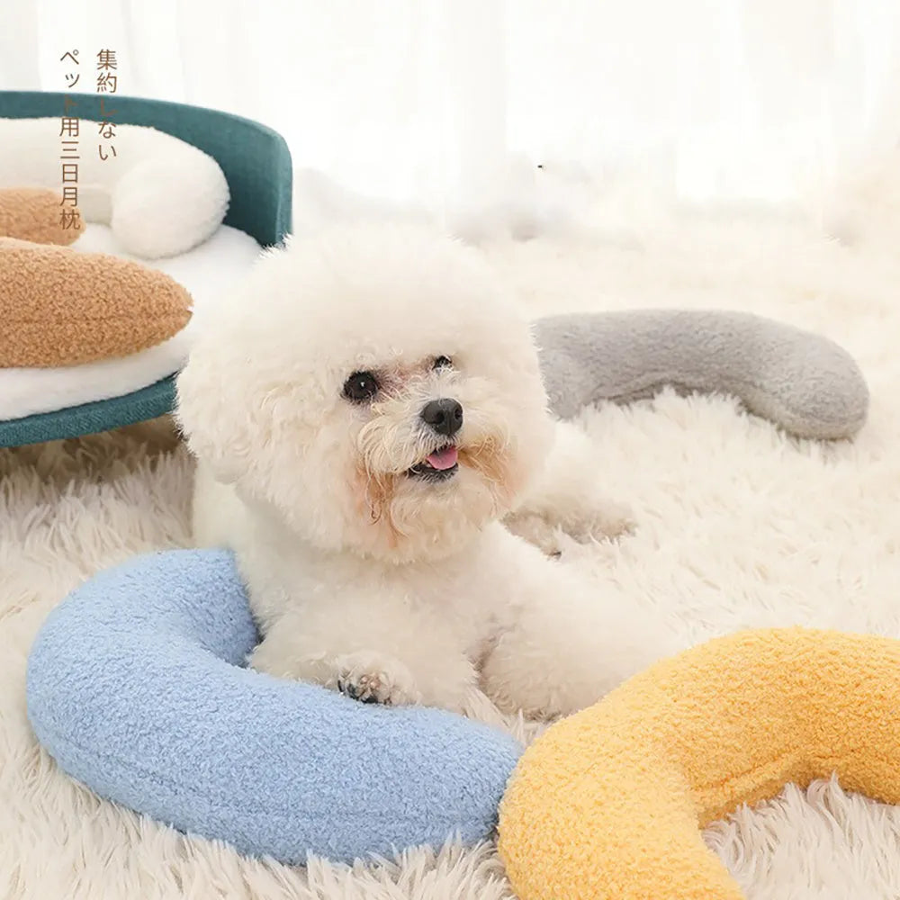 U-shaped blue cat pillow with adjustable collar for cervical support during feline sleep