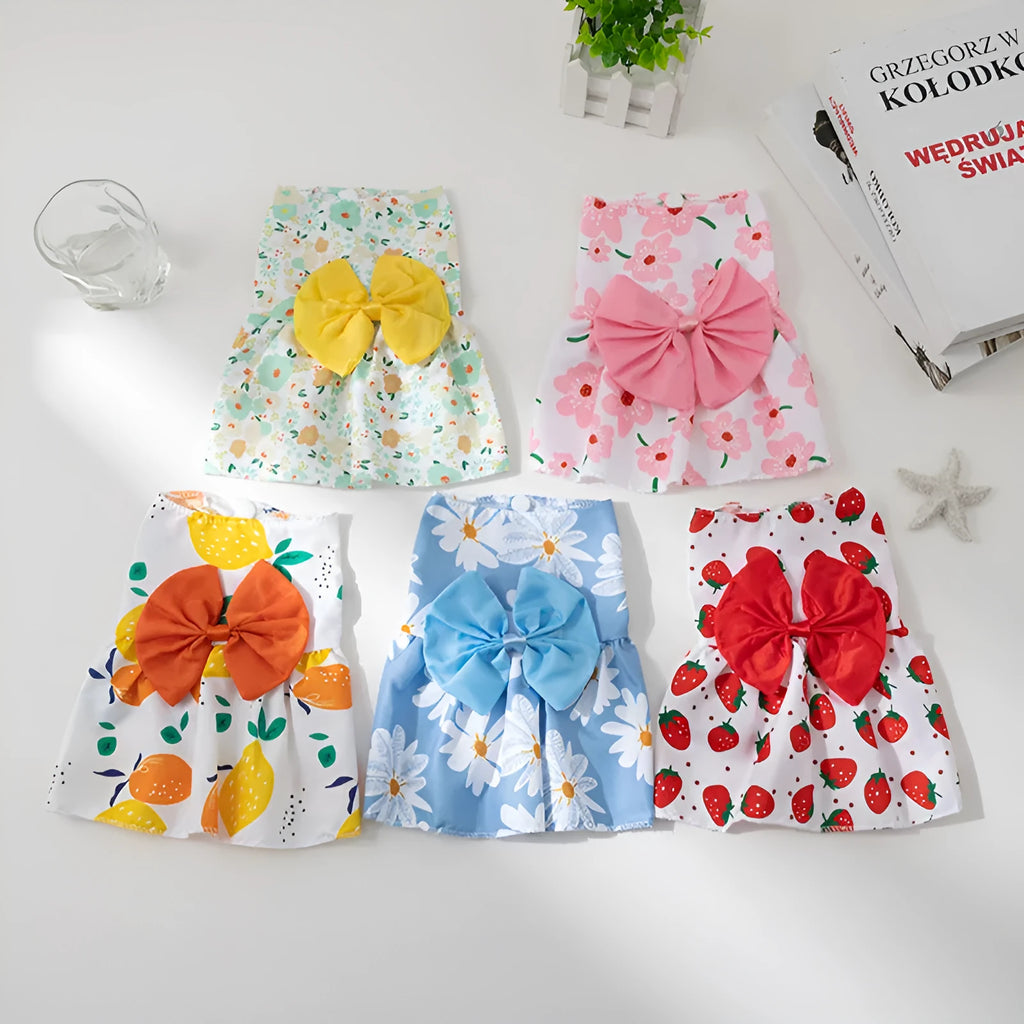 Ultra-thin floral butterfly knot princess dress for dog or cat on a hanger, showing bow colour options.