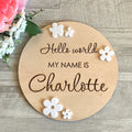 15cm square wooden newborn name label with birth information displayed on plywood plaque