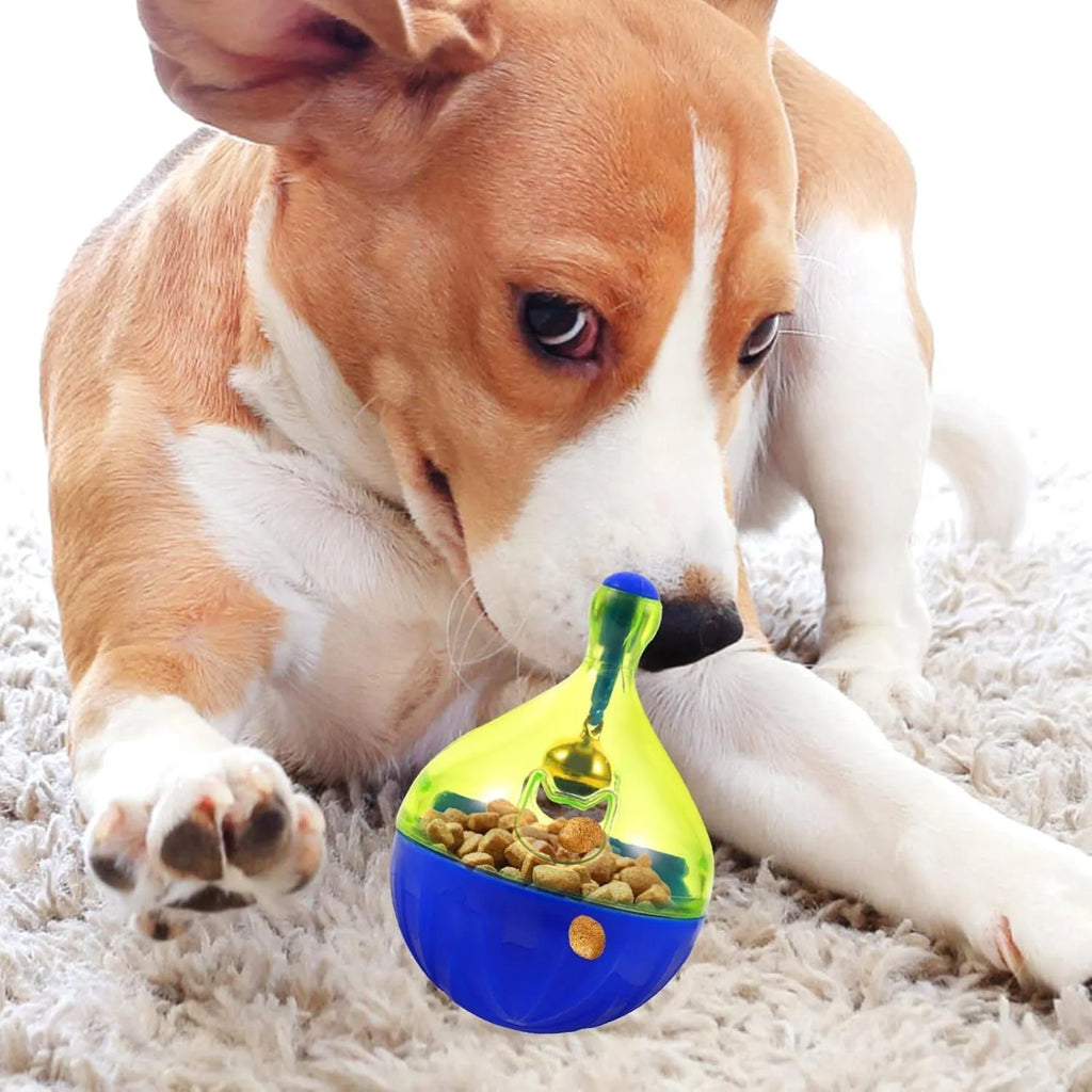 Blue tumbler-shaped interactive treat dispenser ball for dogs and cats on floor