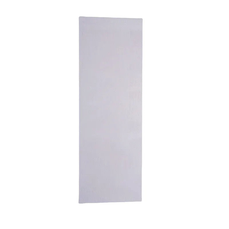 Stainless steel cake scraper with a polygon patterned blade for icing and filling work.