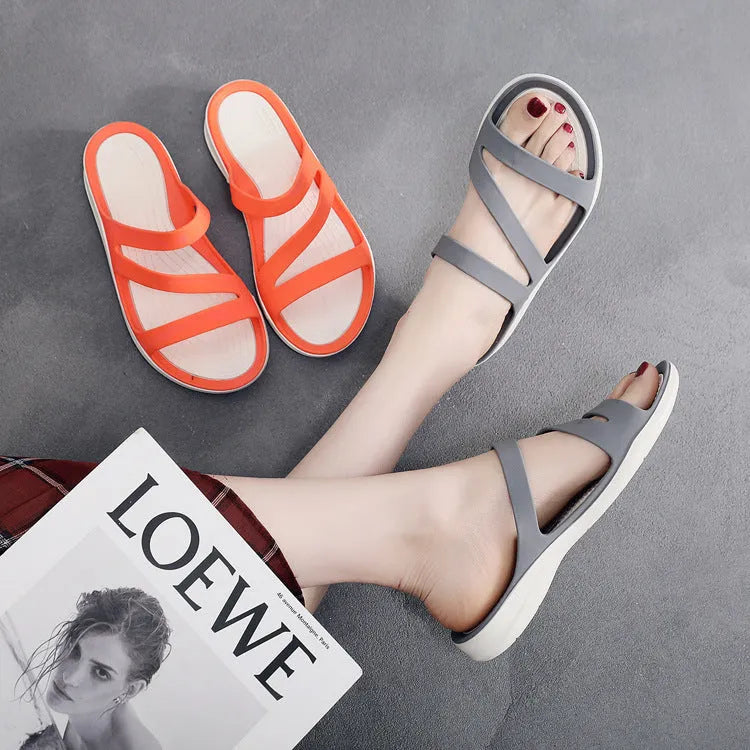 Women's solid-colour summer sandals in breathable PP material, shown in red, purple, blue, black, gray, or pink.