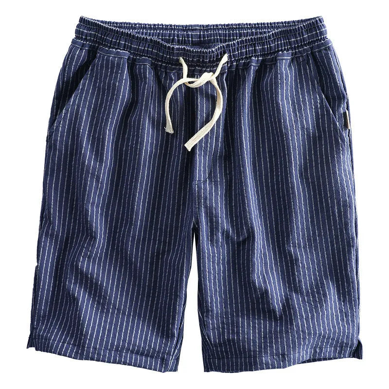 Men's striped cotton casual shorts in a loose straight fit on a mid-waist, shown in light blue colour.