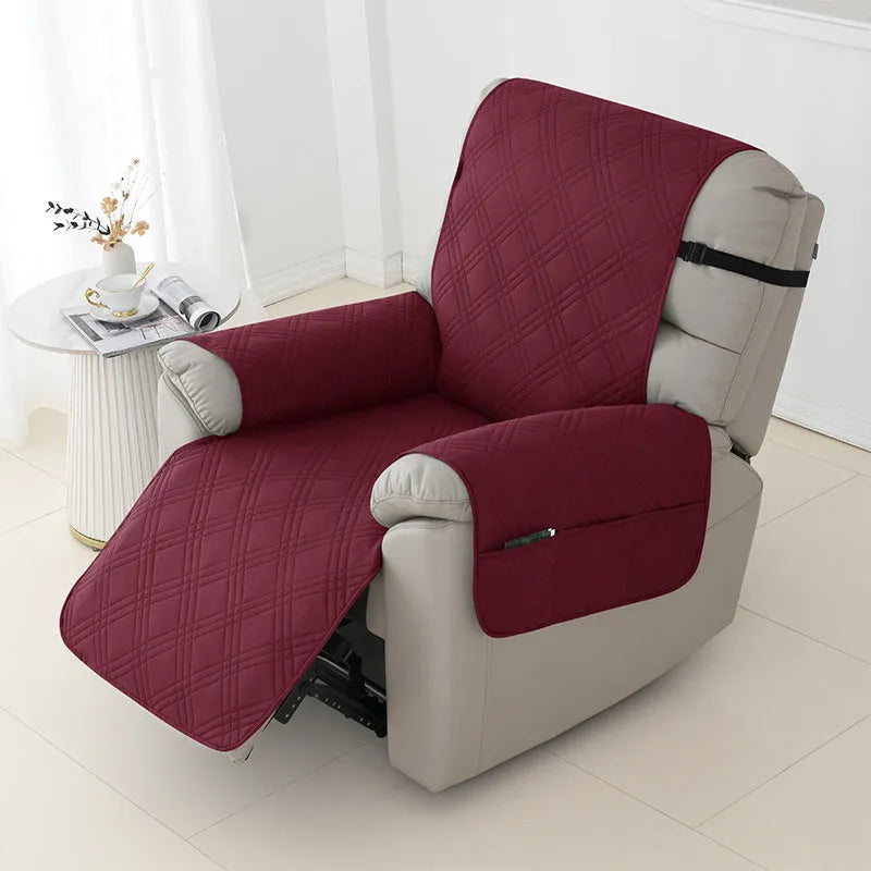 Quilted waterproof sofa cover on a Chivas massage chair in peacock blue colour.