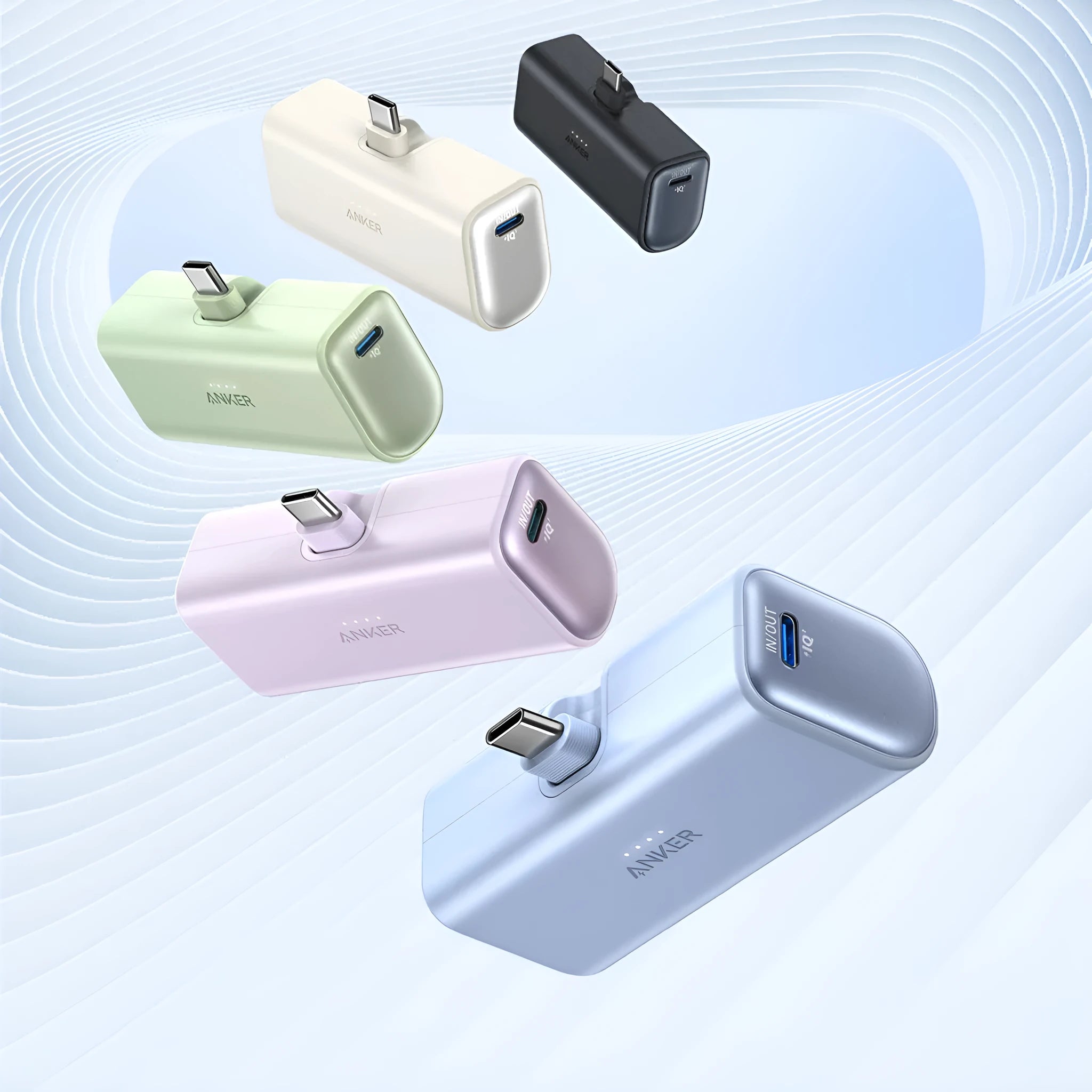 Capsule-shaped 5000mAh power bank in various colours showing Type-C port and foldable C head