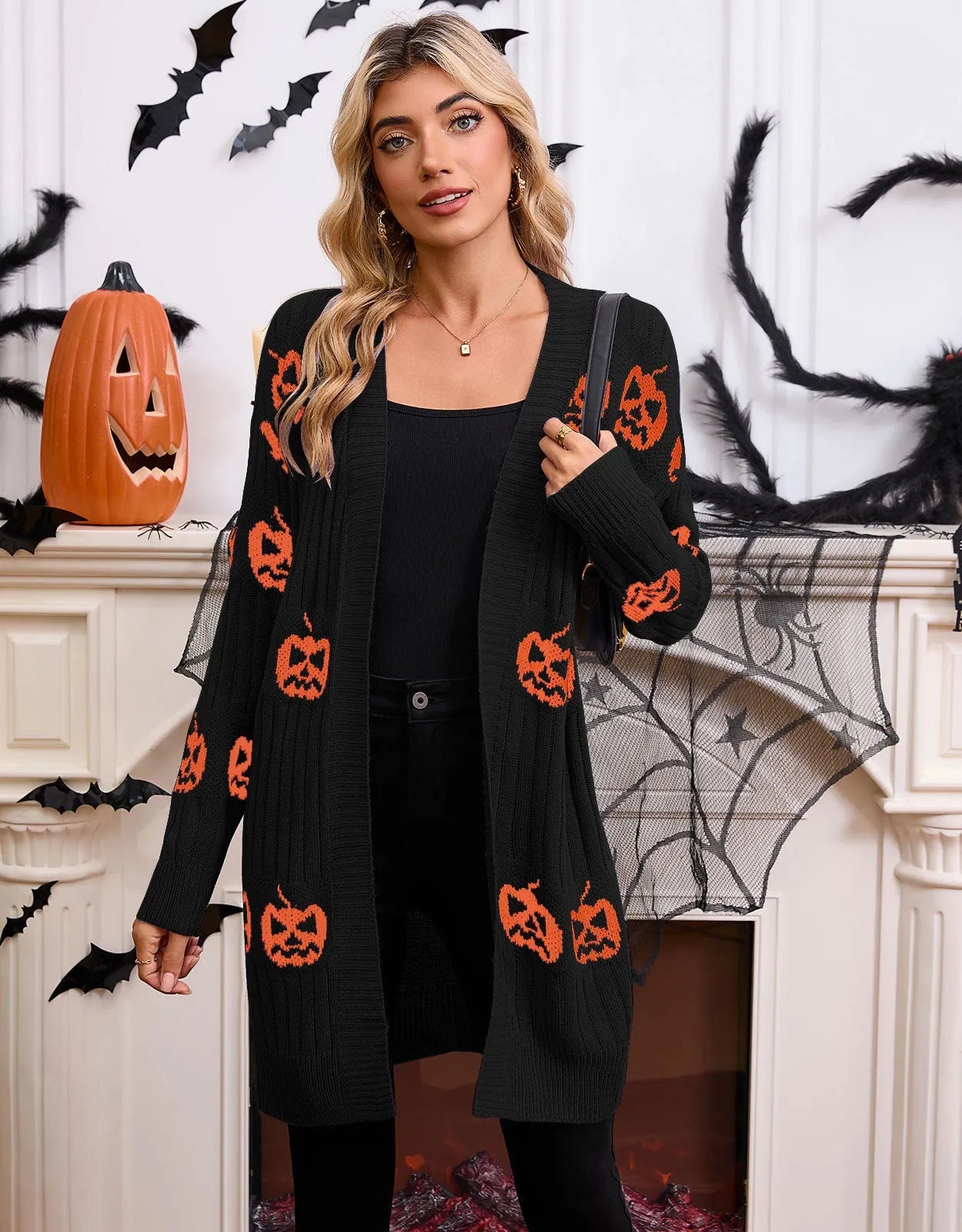 Women's black Halloween cardigan with knitted pumpkin head pattern, straight fit with regular sleeves