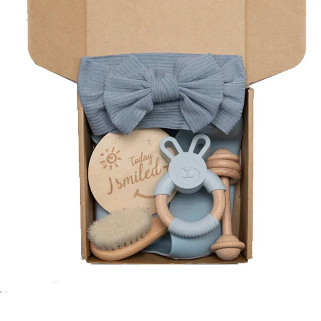 Newborn baby shower toy set of six bath toys in wood and chemical fibre, available in blue, brown, or peach