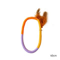 Green cotton rope circular cat toy with feathers and catnip for chewing and interactive play