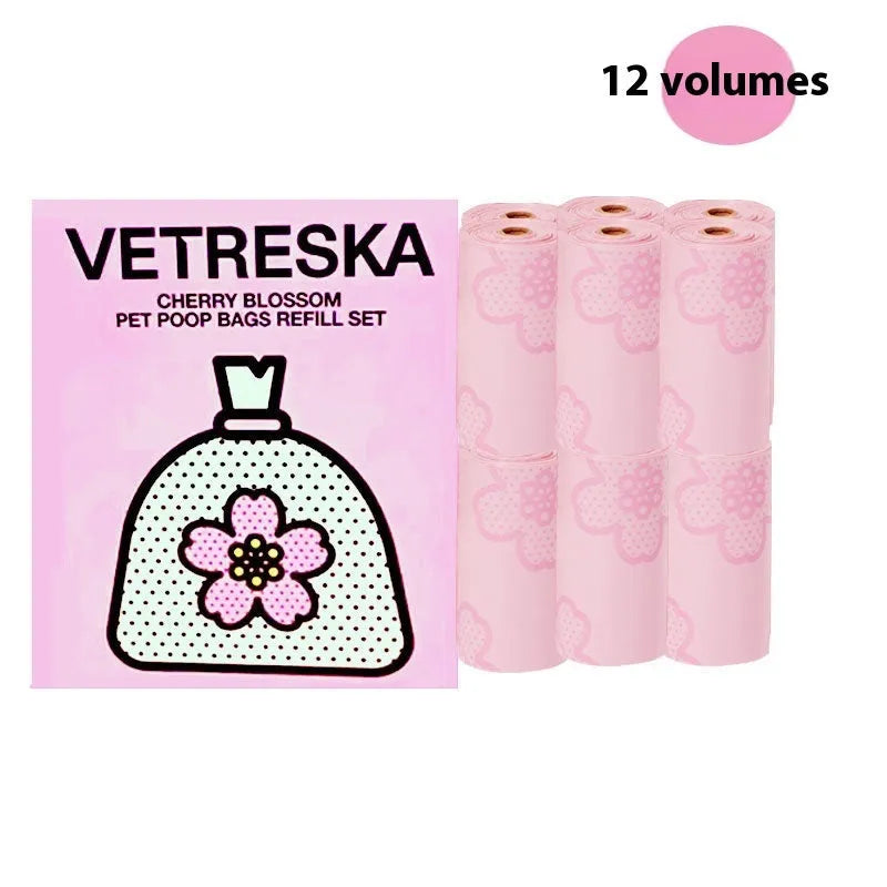 Dog waste bag dispenser capsule with a roll of scented bags in strawberry, orange, or cherry blossom design.