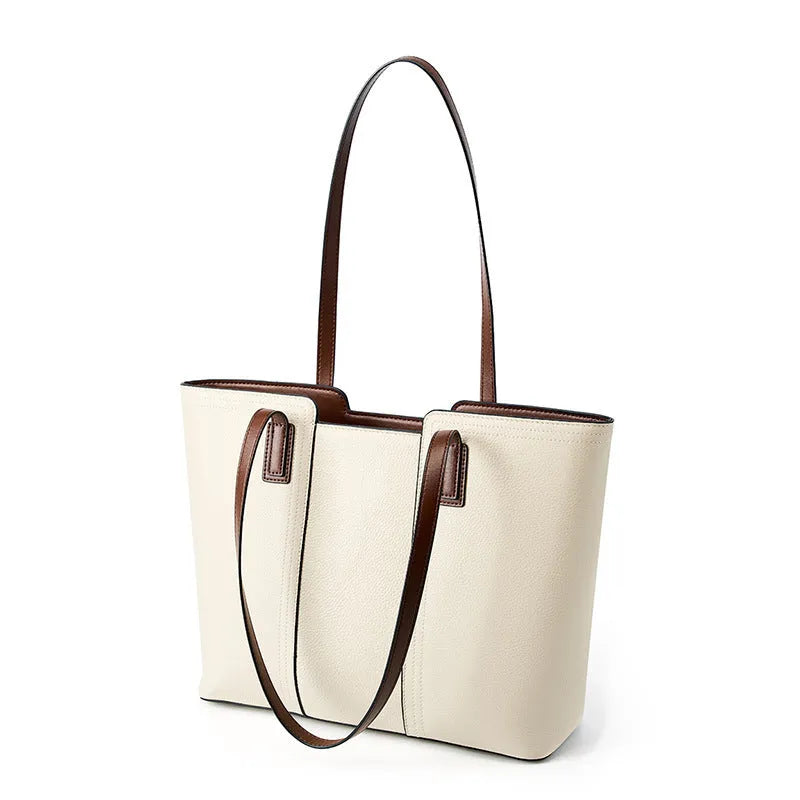 Women's black genuine leather commuter shoulder bag with multiple internal compartments