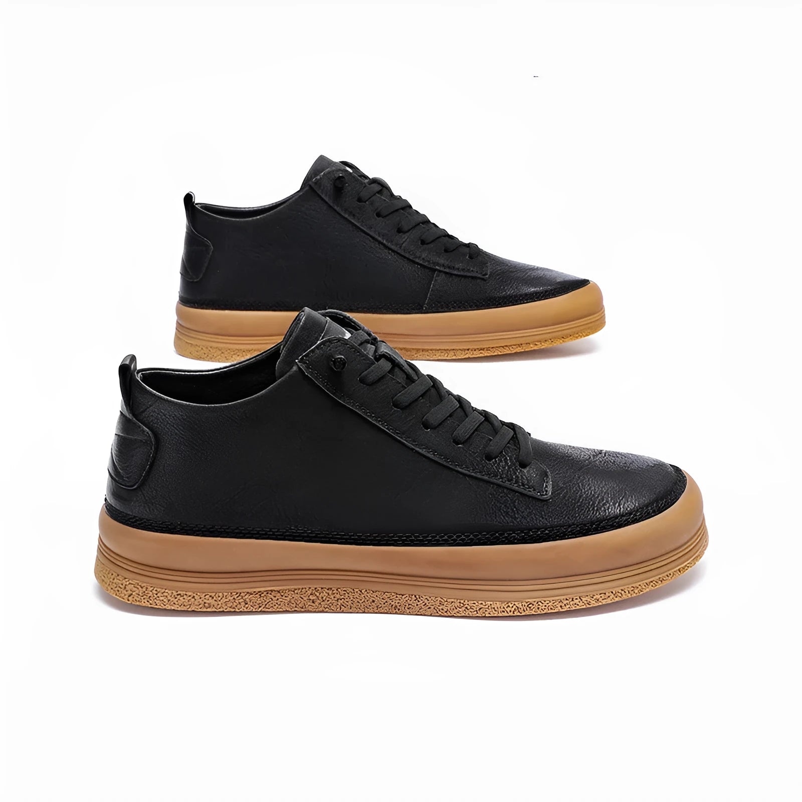 Men's black casual leather shoes with a round toe and white rubber sole on a plain background.
