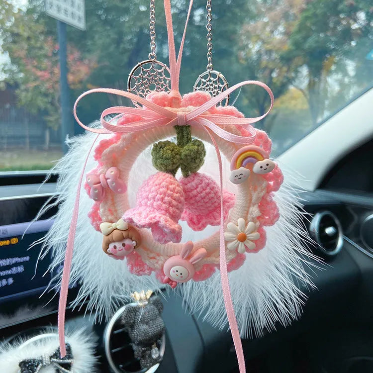 Woven wool bell orchid car pendant in green, pink, purple, and yellow colour options with dream catcher variations