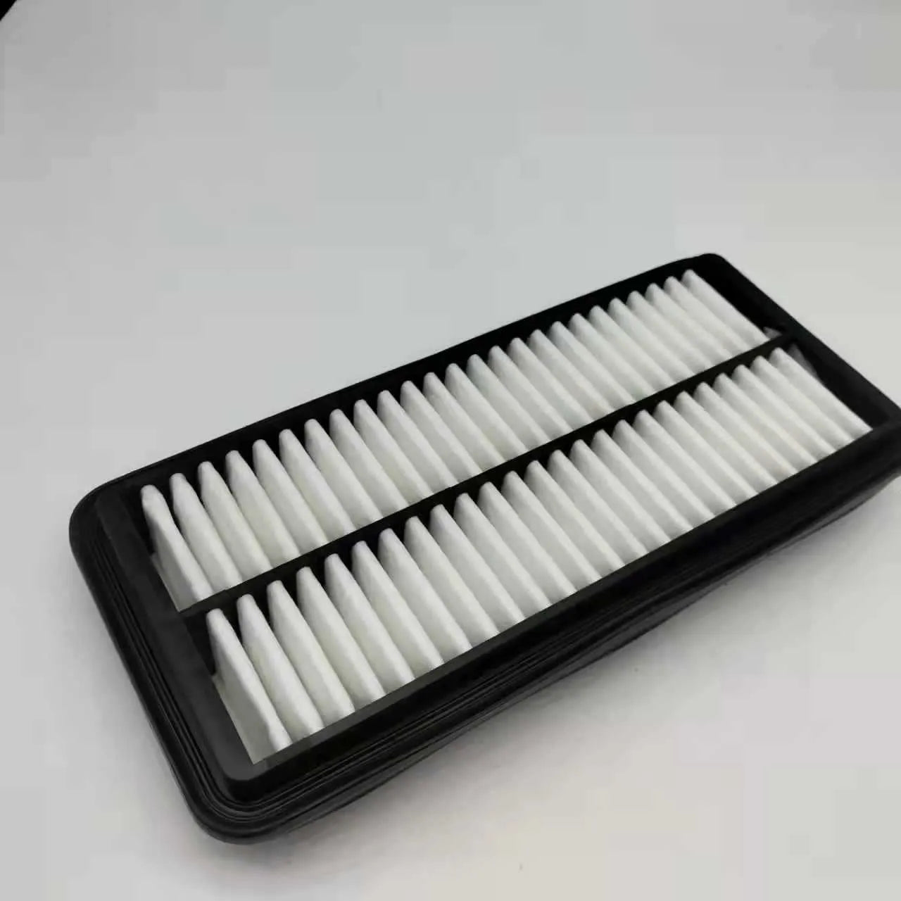 Black car air filter showing 256mm diameter measurement for modern vehicle replacement