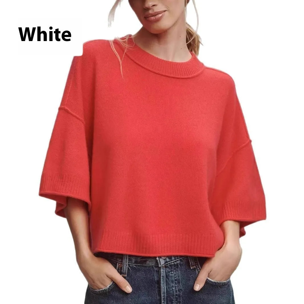 Red hot girl style viscose t-shirt with short sleeves and an exposed navel cut on a mannequin.