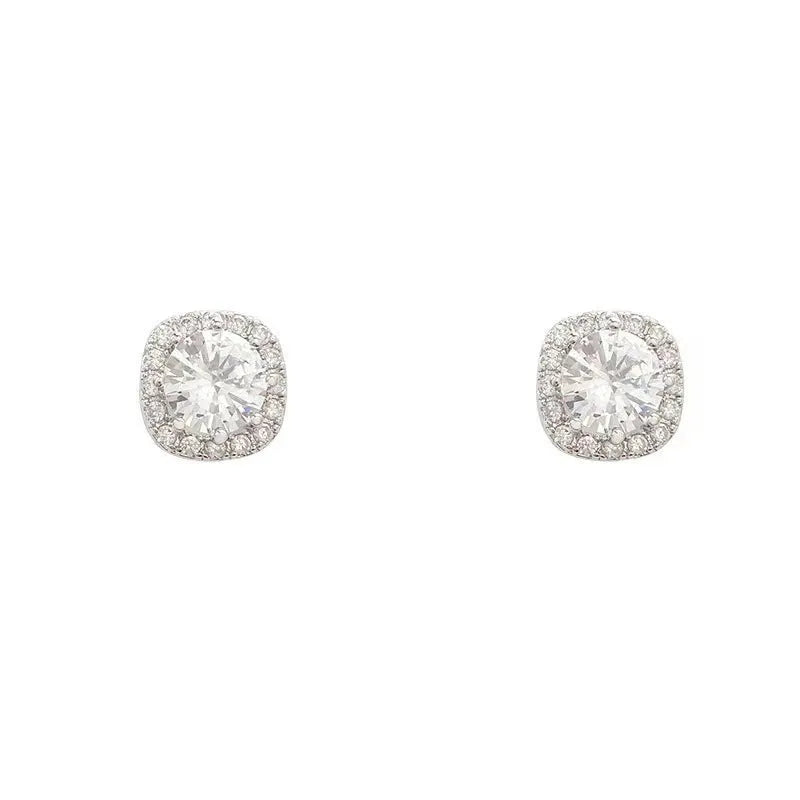 Square geometric earrings with quadrilateral design elements in gold and silver alloy metal