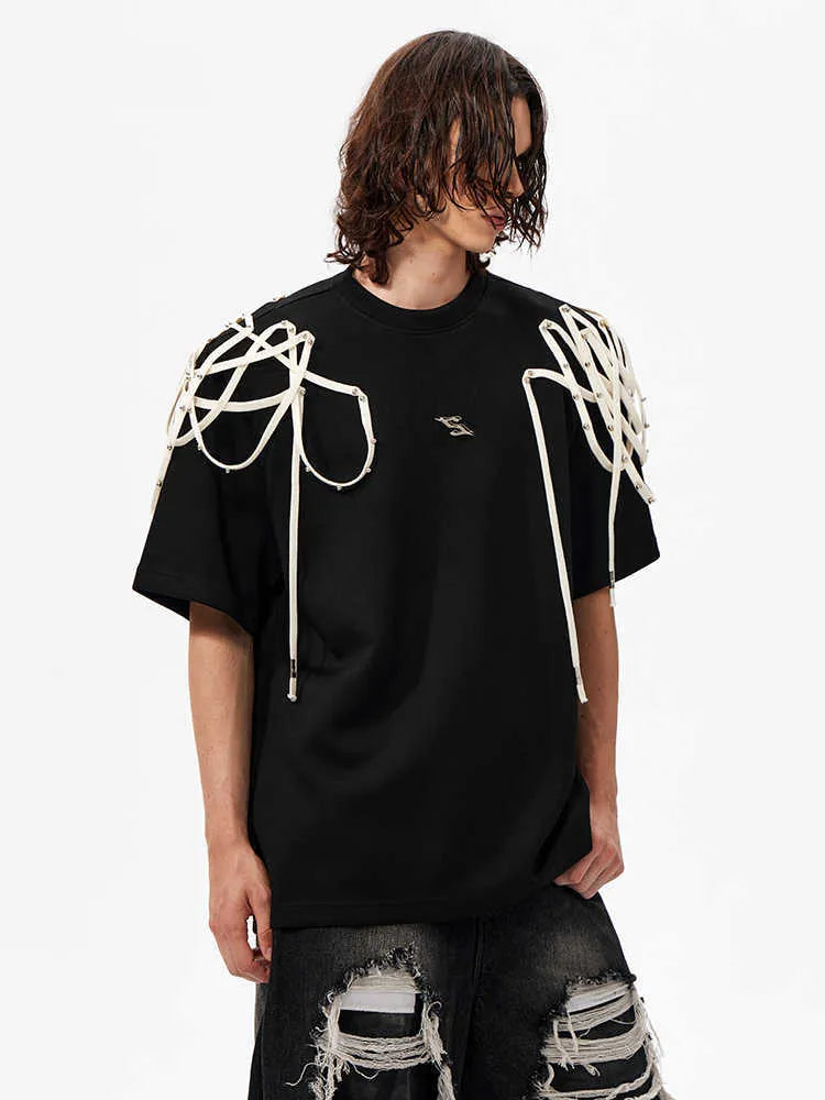 Black loose fit short sleeve T-shirt with padded shoulder and rivet ribbon detail