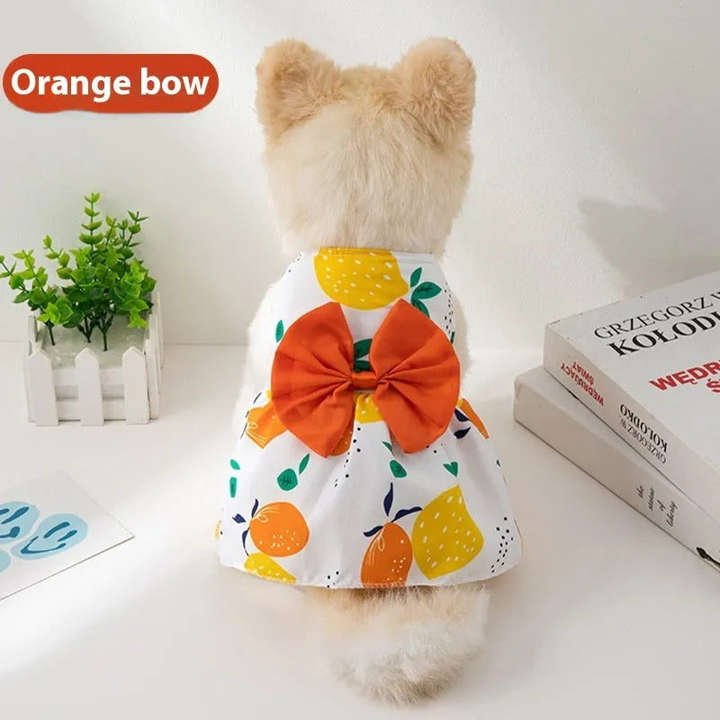 Ultra-thin floral butterfly knot princess dress for dog or cat on a hanger, showing bow colour options.