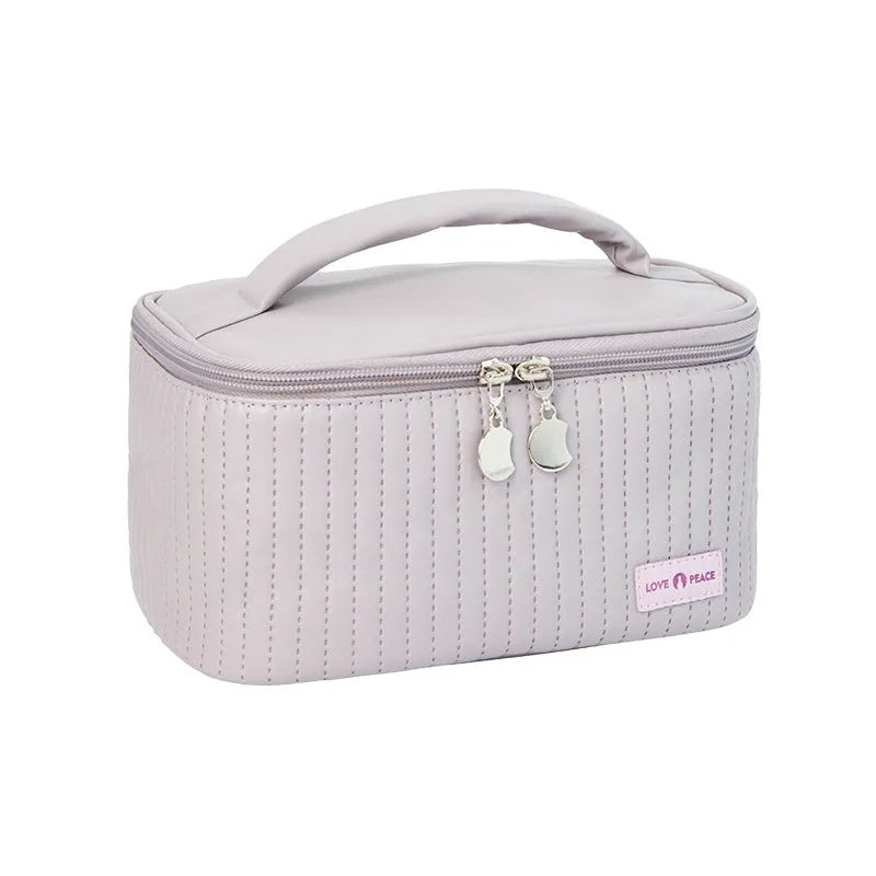 Open-top solid colour PU leather makeup bag in a choice of six colours.