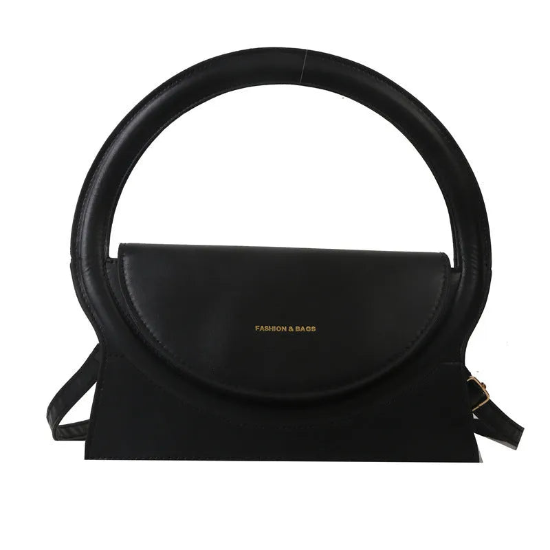 PU leather messenger bag in horizontal square shape with sandwich pockets and stitching details