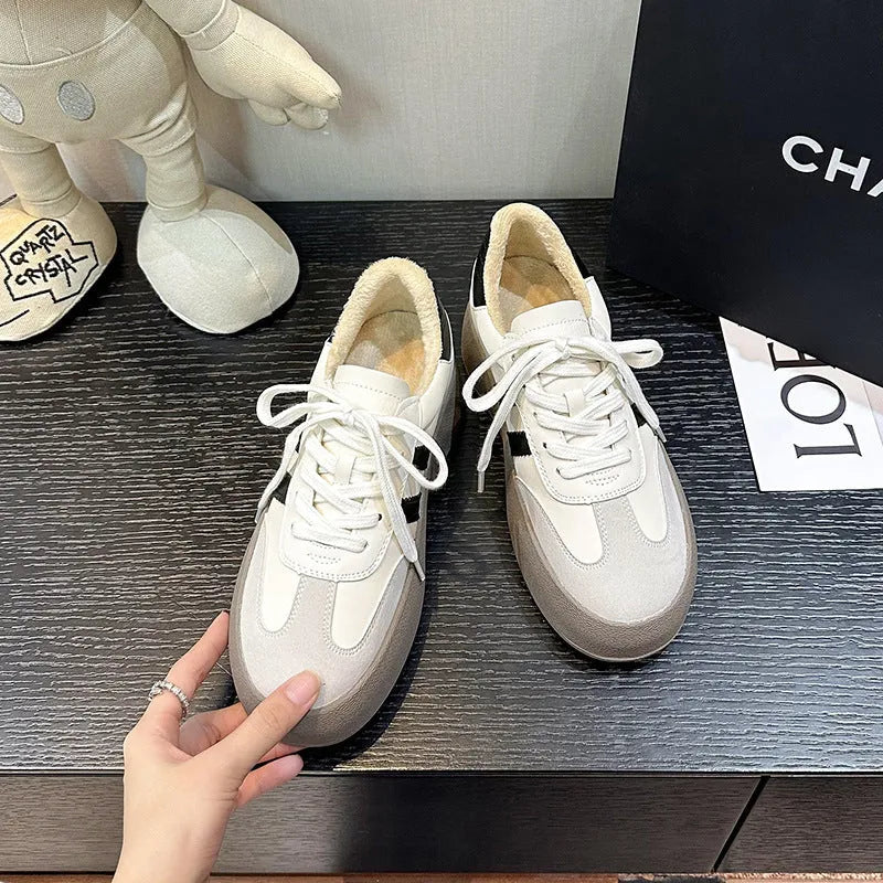Women's vintage distressed leather sneakers with round toe and lace-up front