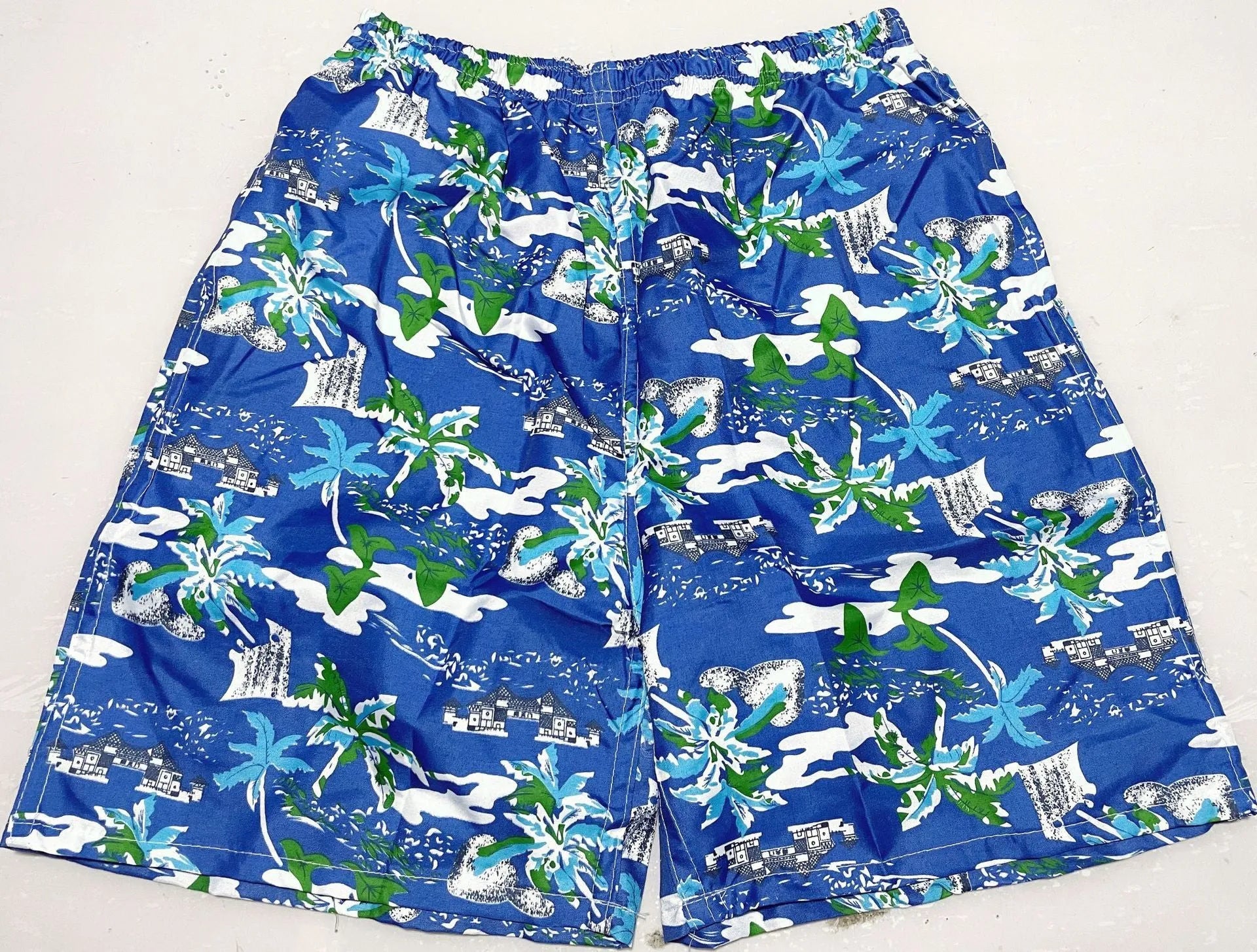 Men's floral print swimming trunks in polyester with five-point design