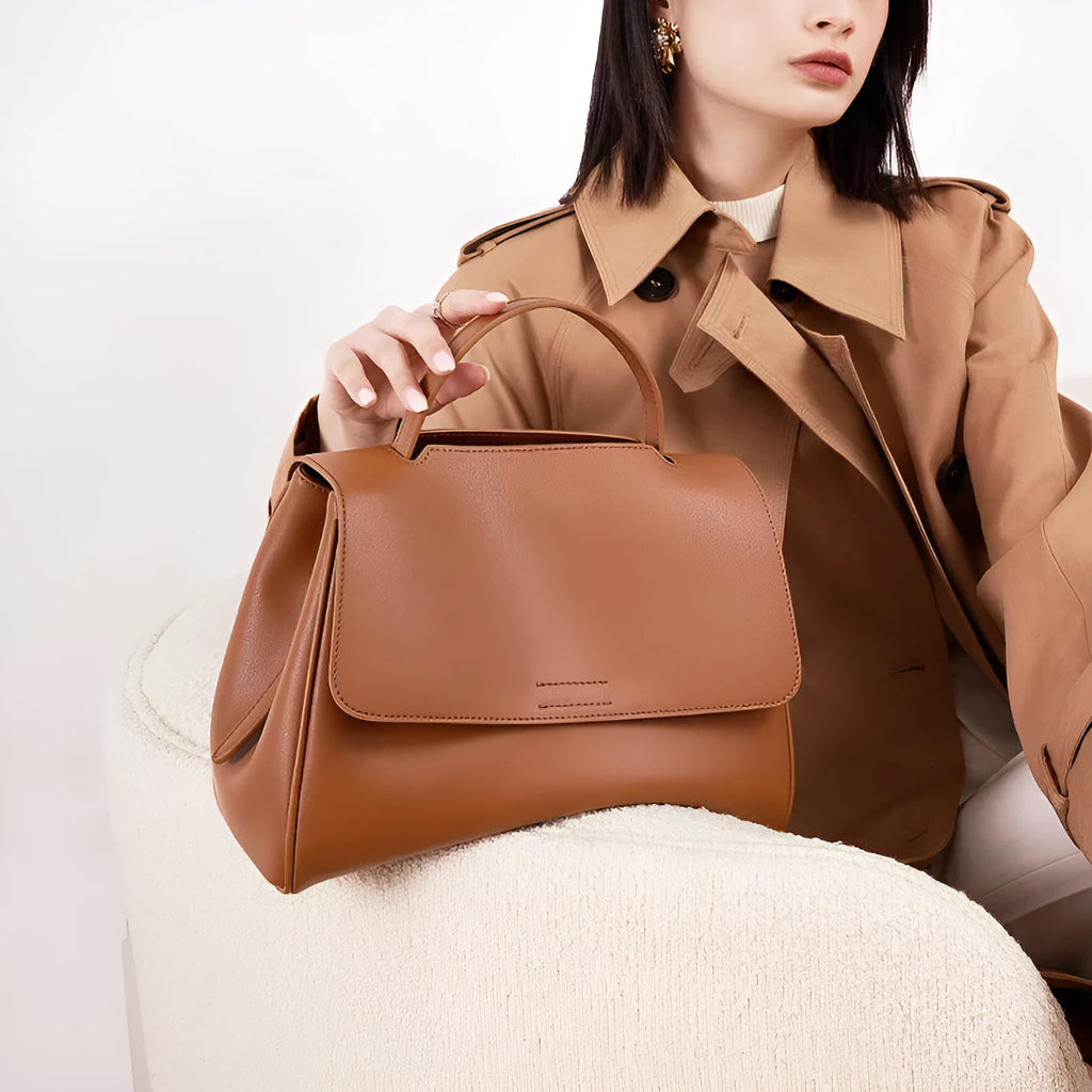 Genuine two-layer cowhide leather crossbody shoulder bag for women, horizontal square shape, solid colour with visible sewing thread detail