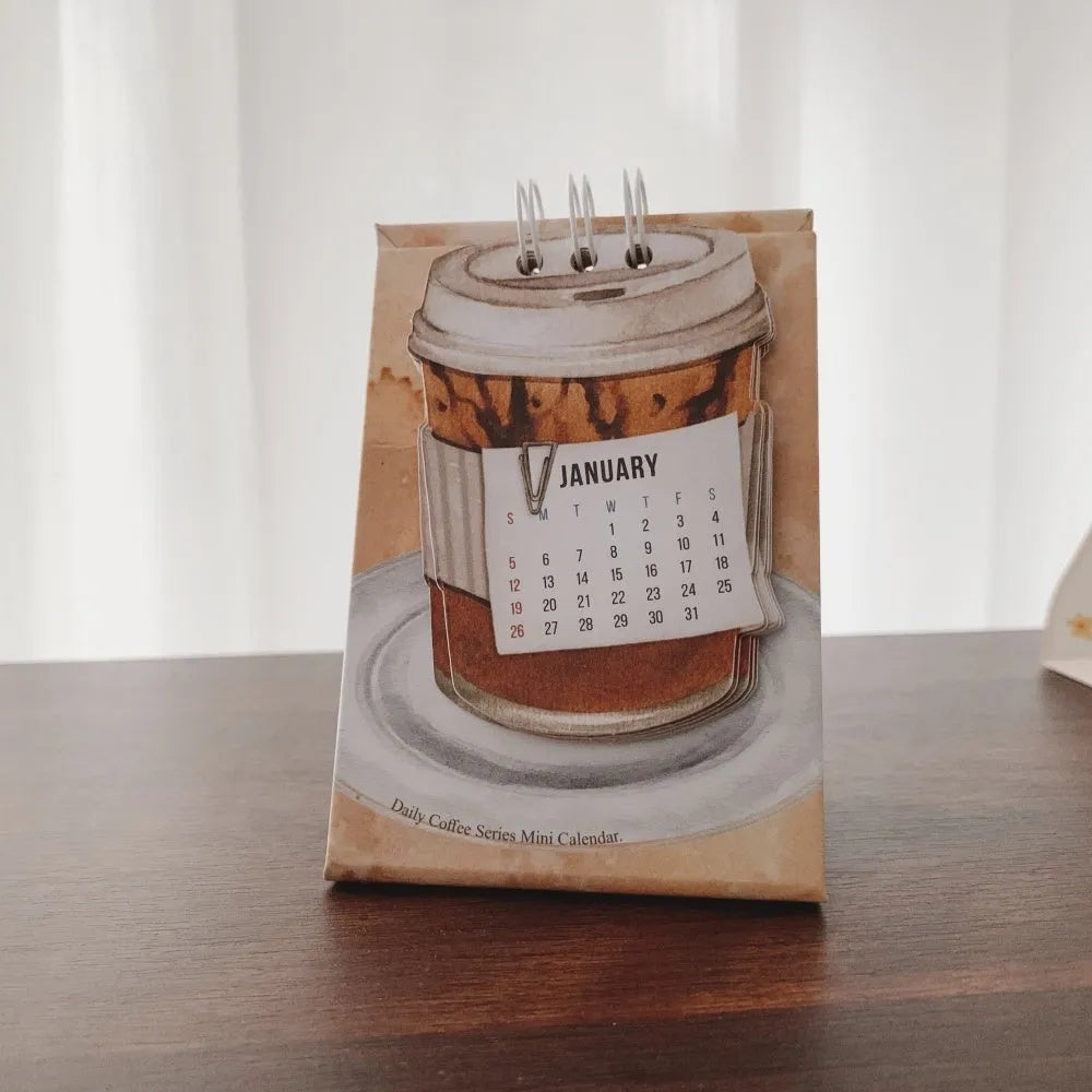 Coffee themed mini desk calendar 2025 with ten different daily designs including Coffee Time and Life Is Not Easy