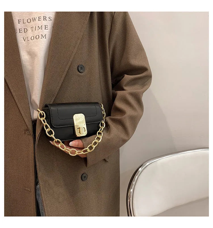 Niche chain shoulder messenger phone bag in horizontal square PU with soft handle and lock detail, brown colour option