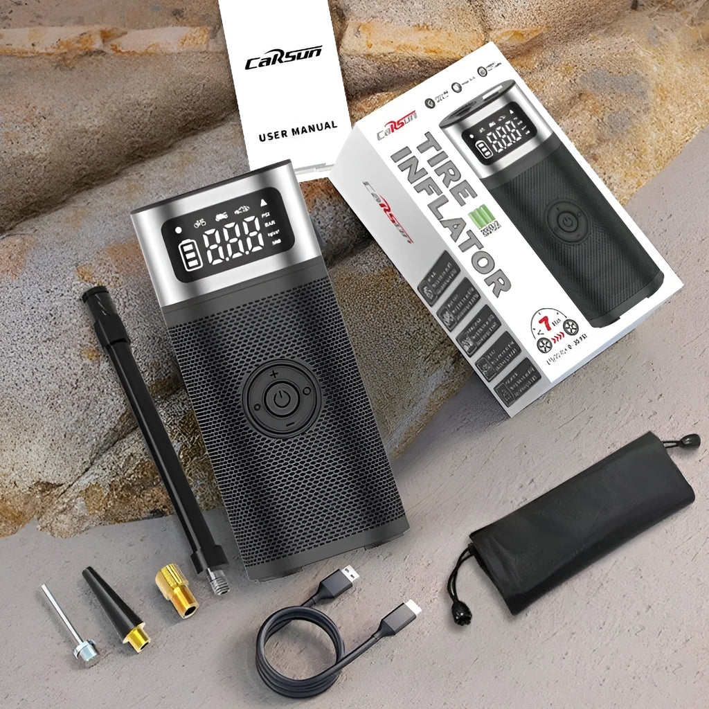 Black portable wireless air pump with metal construction, USB charging port, and 15cm inflation tube