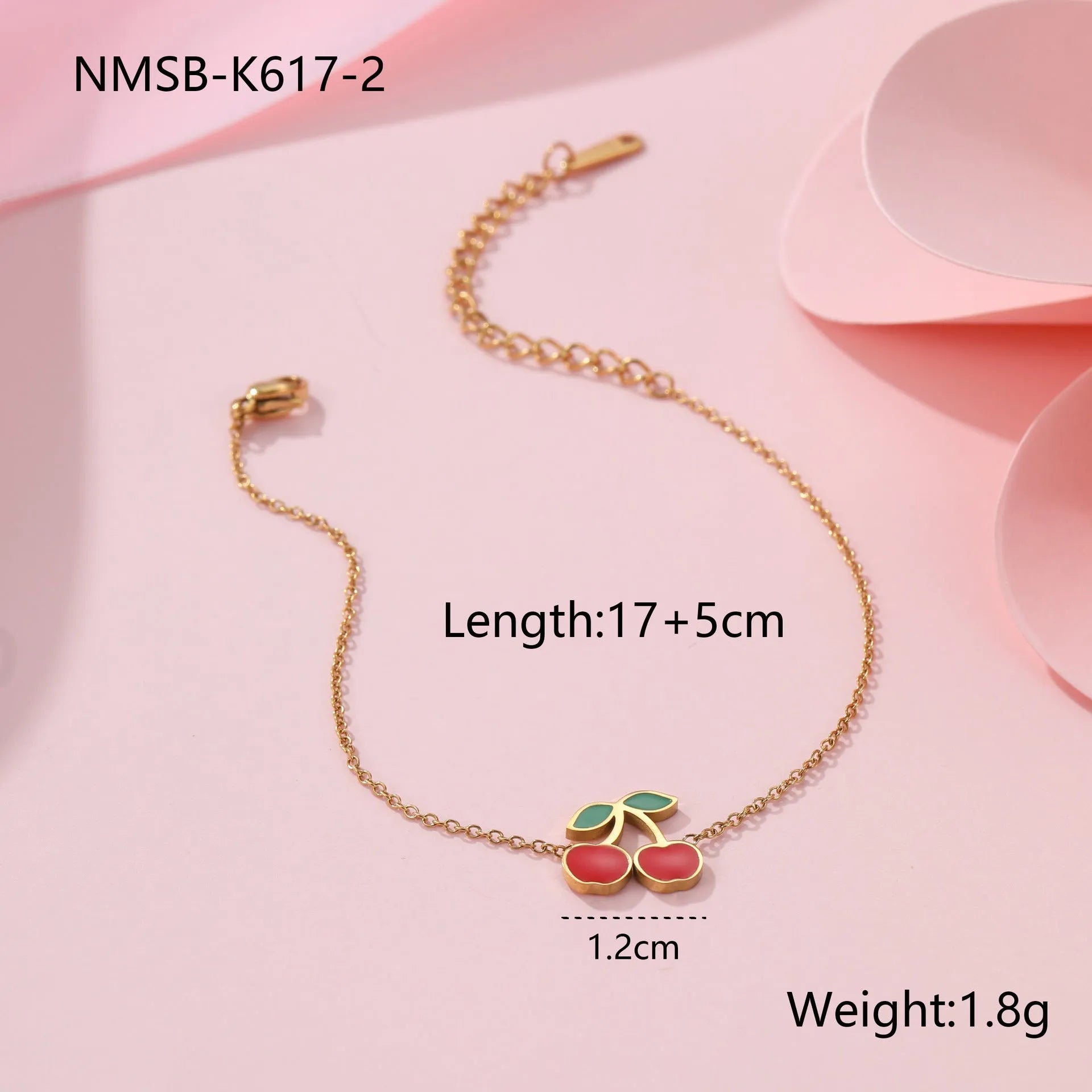 Cherry jewellery set showing necklace, bracelet, earrings, and ring with 18K gold electroplating on stainless steel