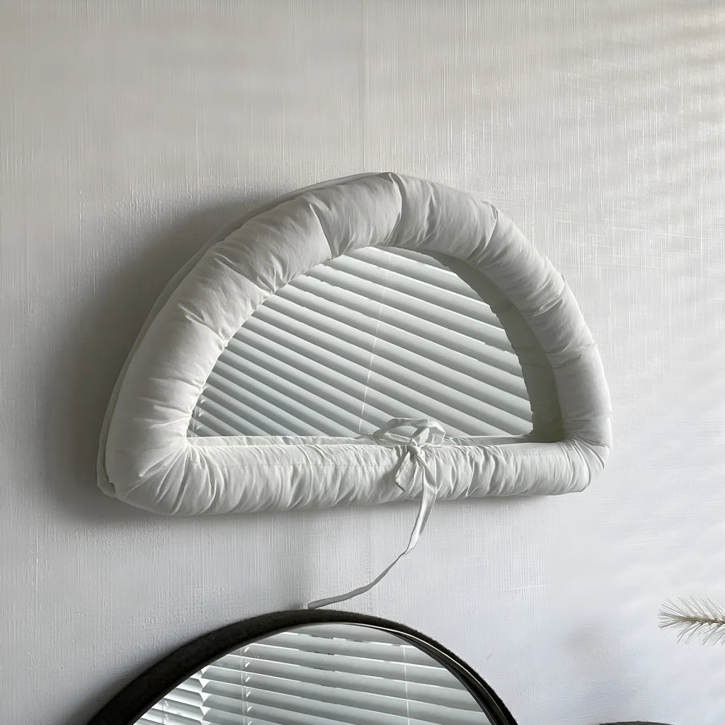Hanging fabric mirror with soft cotton padding for photography backgrounds in solid colours