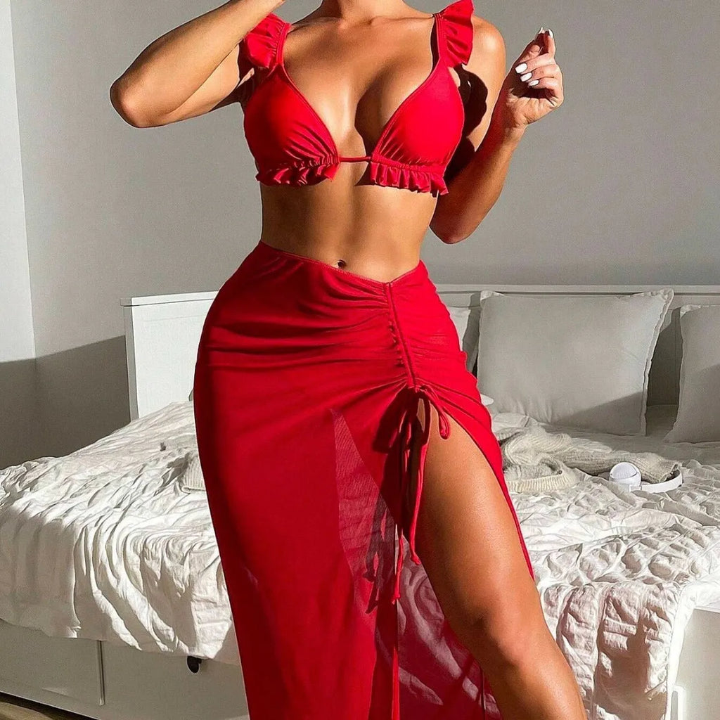 Women's printed split swimsuit three-piece set with bikini top, bottoms, and skirt in multiple colour options.