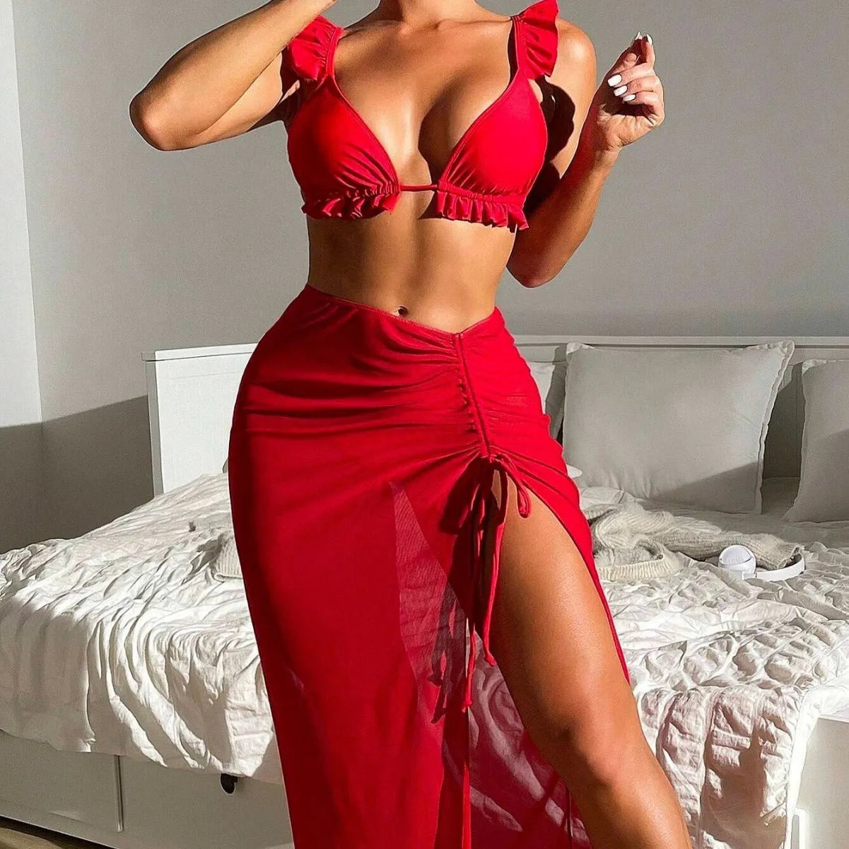 Women's printed split swimsuit three-piece set with bikini top, bottoms, and skirt in multiple colour options.