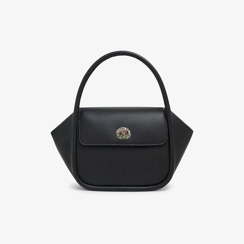 Women's wing-shaped leather tote bag with latch closure and cross-body strap in four colour options