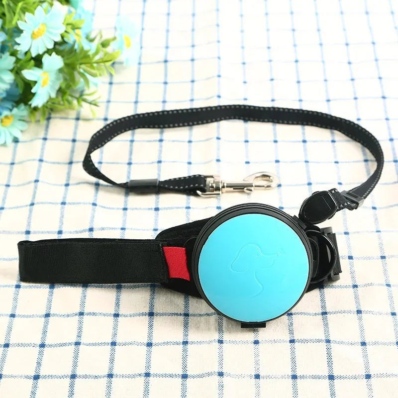 Automatic retractable dog leash extended to 3 metres, shown in vibrant orange colour with ergonomic handle.