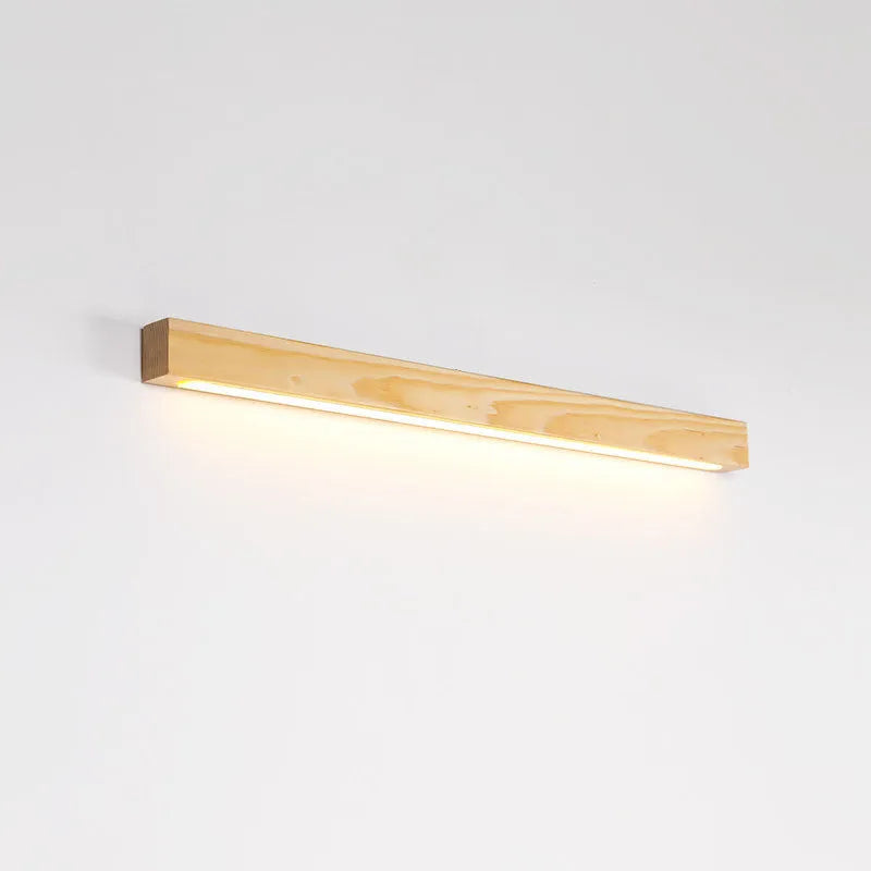 Walnut colour wood and acrylic wall lamp strip with LED lighting in a minimalist design on a wall.