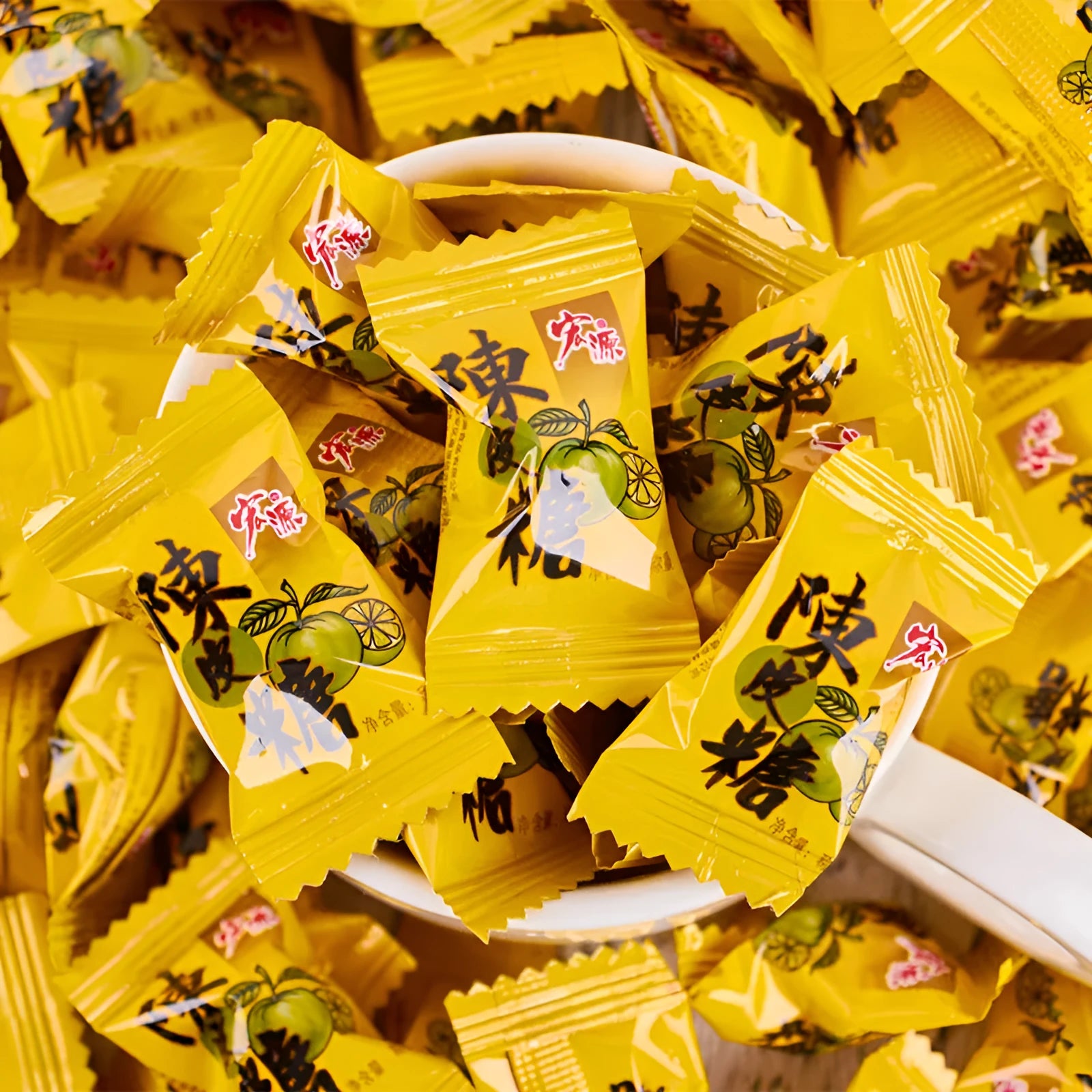 Assorted bags of plum, guava, and tangerine peel flavoured hard sweets for parties.