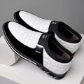 Slip-on men's plus size casual leather shoes in black with round toe and rubber sole