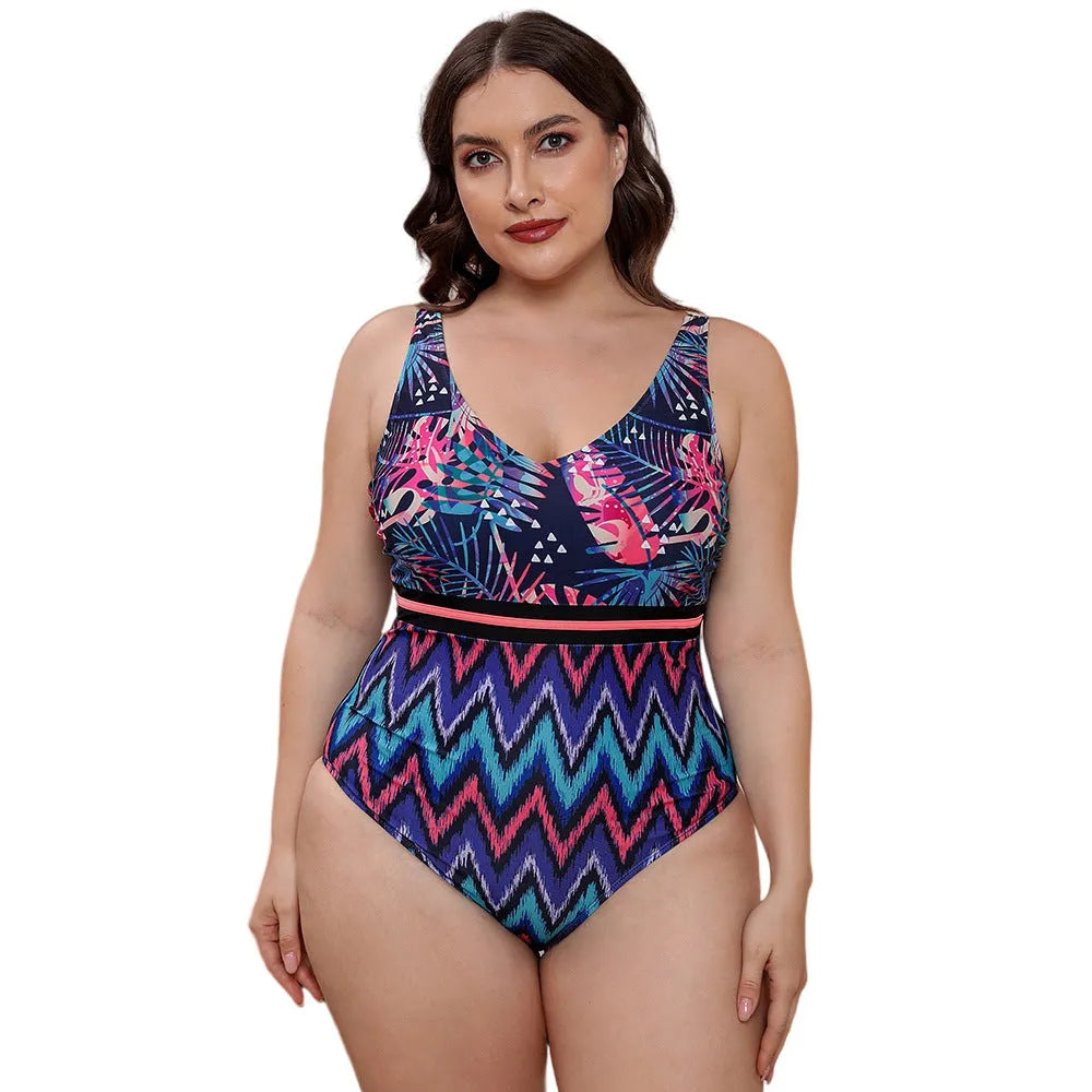 Women's printed spaghetti strap one-piece swimsuit in blue, white, and green patterns with vest style