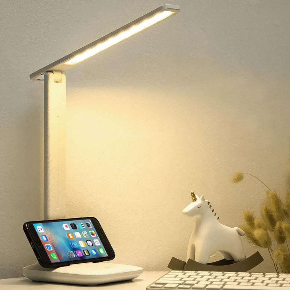 White bedside lamp with touch dimming control and USB charging port for children's bedrooms